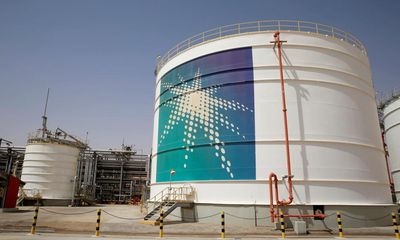 Saudi oil group Aramco to pay more to state despite profits drop