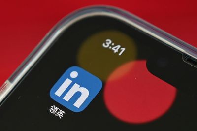 LinkedIn closes China service, cuts over 700 jobs
