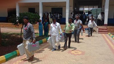Election staff reach booths in Hassan
