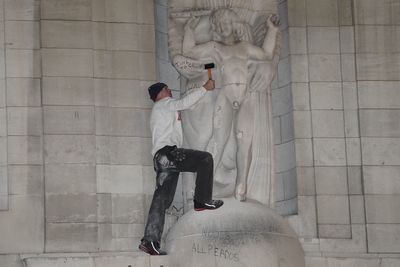 BBC begins work to repair defaced statue by controversial sculptor Eric Gill