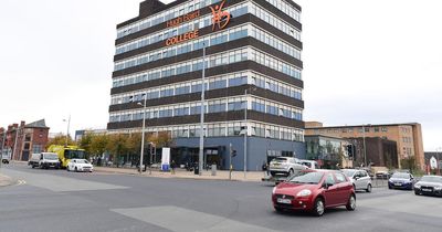 Two in hospital after bus and van crash on busy road