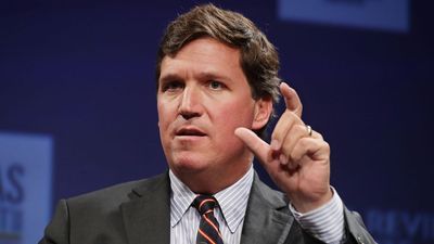 Scoop: Tucker Carlson accuses Fox of fraud, contract breach