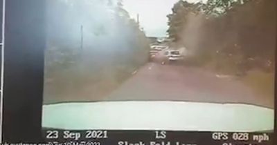 Dramatic moment car FLIPS while being chased by cops before driver flees scene