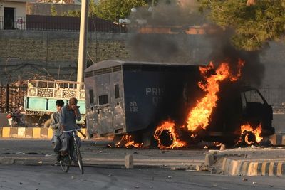 Pakistan ex-PM Khan remanded in custody after arrest prompts riots