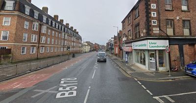 Major road closed as two people 'cut out of car' after crash