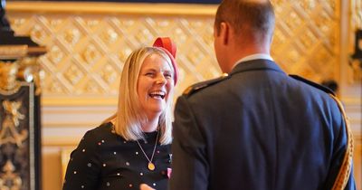 Proud moment for NI football stalwart as she receives MBE from Prince of Wales