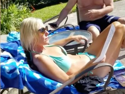 Bikini-clad Lori Vallow is served court papers for missing kids as she sits by Hawaii resort pool in new video
