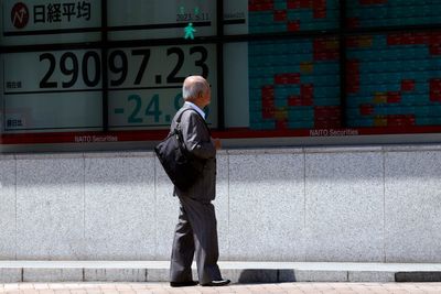 Stock market today: Asian shares mixed in choppy trading after US inflation report