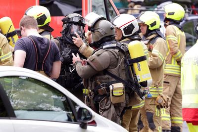 Official: Explosion at residential building in Germany injures 12 first responders
