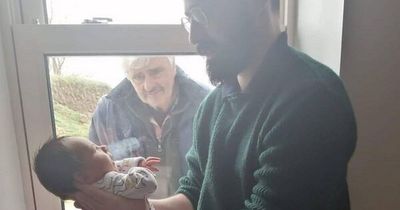 Poignant picture of Irish grandfather visiting new grandson through window during Covid featured in Netflix documentary