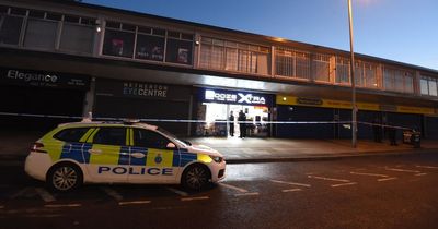 Man slashed in the face after 'commotion' outside shop