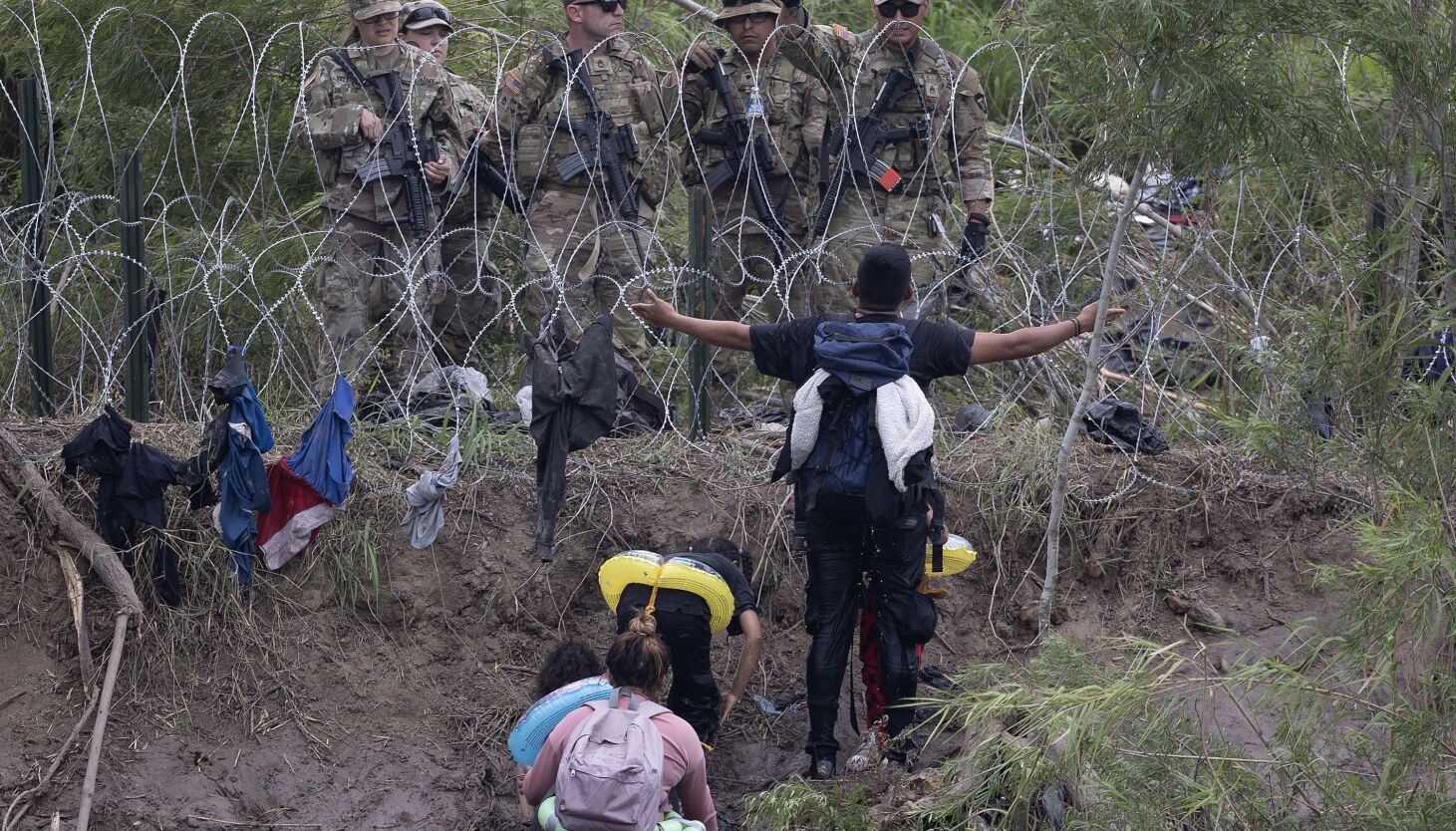 Migrants rush across U.S. border in final hours before…