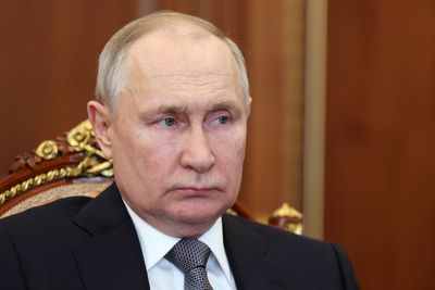 Russian woman charged for ‘desecrating’ Putin grave