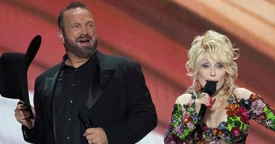 Dolly Parton wants a threesome with Garth Brooks and his wife joking she has 'hall pass'