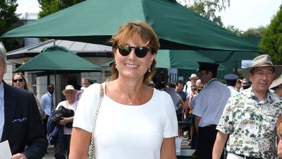 We're obsessed with Carole Middleton's peach bag that features designer-esque detailing and classic gold chain
