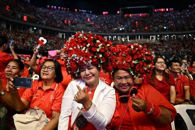 Colours and music clash as Thai parties rally