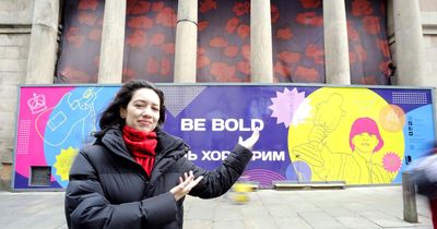 Ukrainian artist who fled war creates piece to decorate historic city building