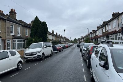 Man drove BMW into parked cars after being stabbed, neighbours say