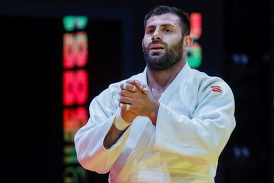 Russia's Arman Adamian wins world judo gold under neutral flag