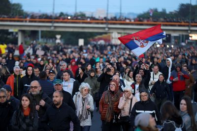 Protesters march in Serbia to demand better security after shootings