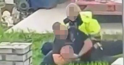 Welsh police officer seen punching man to head is suspended