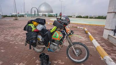 Watch This Solo Moto Traveler Ride Her Suzuki DR650 Across Iraq