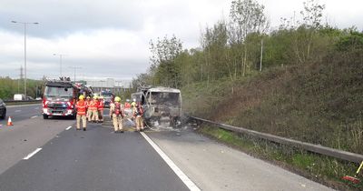 Exploding propane tank hits car on M60 after vehicle bursts into flames