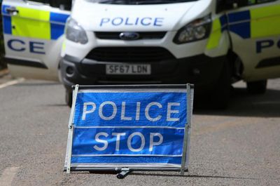 Police close Glasgow road following crash involving car and motorbike