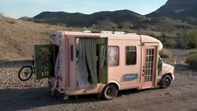 Artist Converts Small Shuttle Bus Into Cozy Camper For Just $9,000