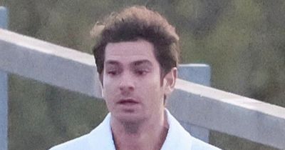 Andrew Garfield makes daring dash over major London road in dressing gown for new movie