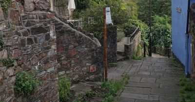 Bus stop that leads to nowhere still stands 15 years after it was built as a joke