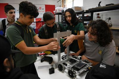 Robots, a barbershop and bagpipes: a Sydney school reinvents its tough past and what it means to love learning