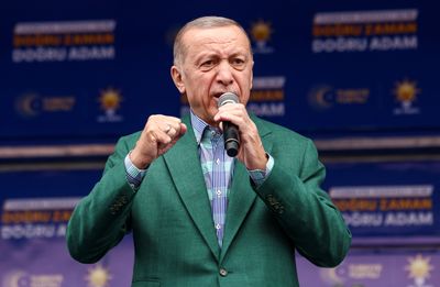 In Turkey election, Erdogan doesn't flinch as he fights for political life