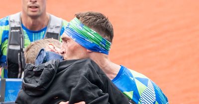 Kevin Sinfield carries Rob Burrow over Leeds marathon finish after pushing pal 26 miles