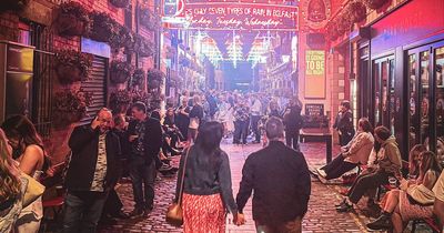 Cathedral Quarter - NI DJ trying to find couple in beautiful photo