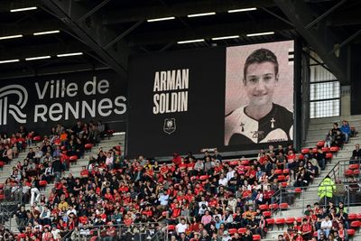 French club hold emotional tribute for slain AFP reporter