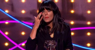 Claudia Winkleman fights back tears on stage after double BAFTA win for The Traitors