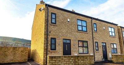 Beautiful canal-side house in Greater Manchester town boasting picture-perfect views of the Pennines