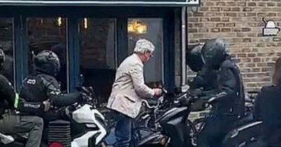 Moment fearless man, 70, fights off moped thieves trying to take his £2,500 bike