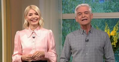 Holly Willoughby and Phillip Schofield put on brave face in This Morning return amid 'feud' rumours