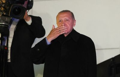 Analysis-Turkey's Erdogan cruising, challenger scrambling toward runoff election