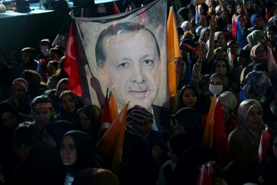 Resurgent Erdogan heads for historic election runoff