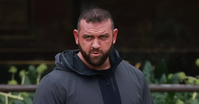 CCTV captures prison officer carrying 'bulging holdall' full of drugs into jail