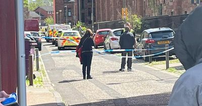 Maryhill street cordoned off by police due to 'ongoing incident' as man arrested
