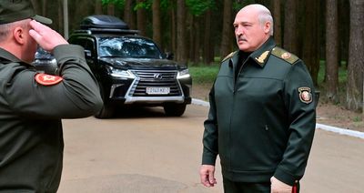 Photos of Belarus leader emerge after days of absences that sparked health rumors