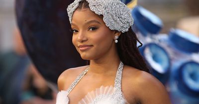 The Little Mermaid star Halle Bailey dazzles in a white shell-themed gown at UK premiere