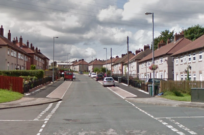 Man arrested on suspicion of double murder after two found dead in Huddersfield home