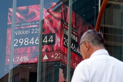 Stock market today: Asian shares turn lower after China economic data weaker than expected