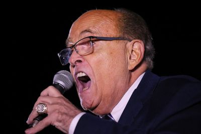 Rudy Giuliani accused of forcing aide to give him oral sex while on speakerphone to Trump