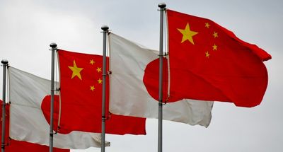 Japan, China ministers make first call on defence hotline